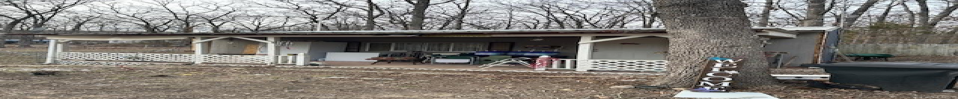 Residential For Sale View of outdoor structure featuring covered porch