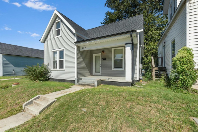 View of front of home with a front lawn