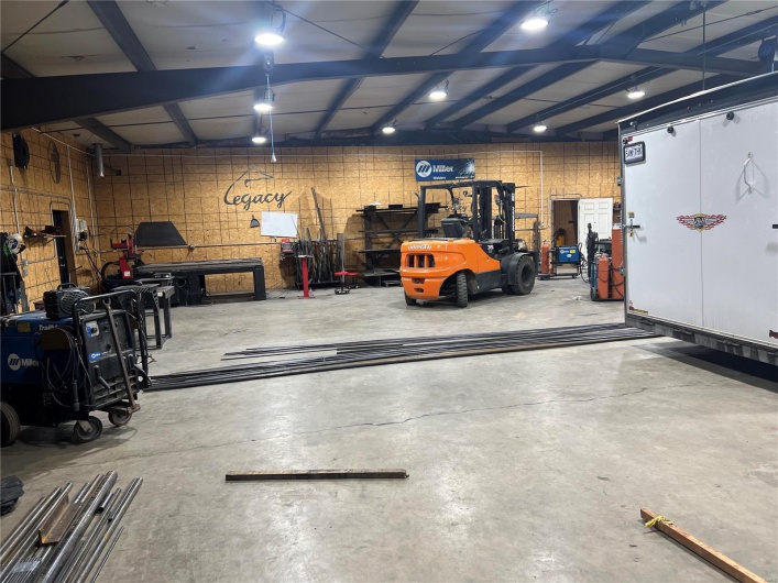 Garage featuring a workshop area