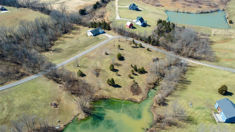 Aerial view with a rural view and a water view