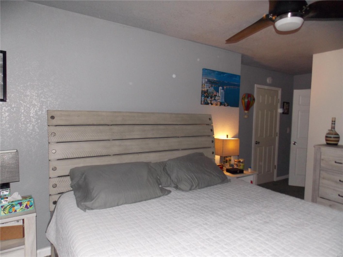 Bedroom featuring a ceiling fan