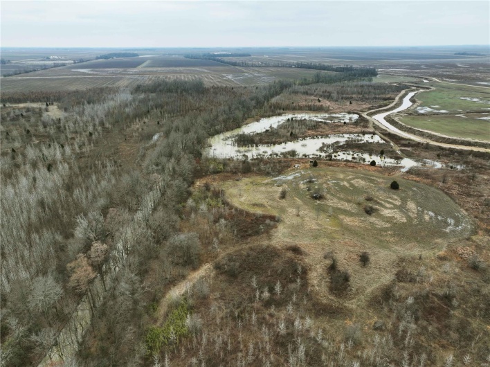 Birds eye view of property with a rural view