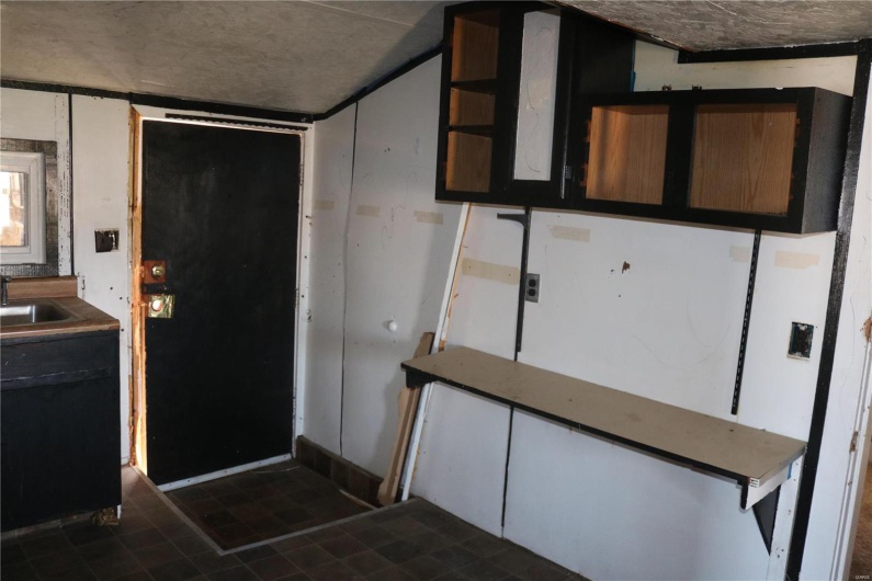 Upstairs Kitchen with a sink
