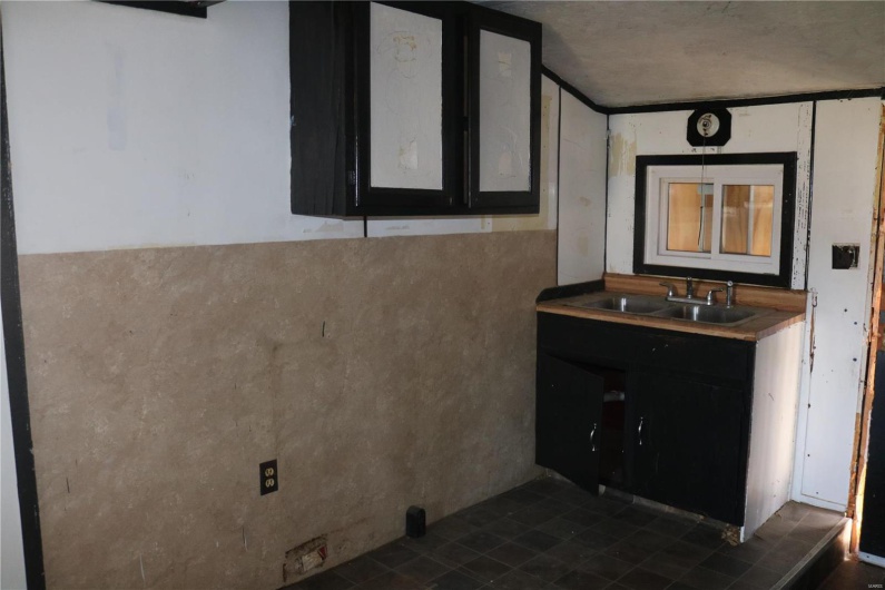 Upstairs Kitchen with a sink