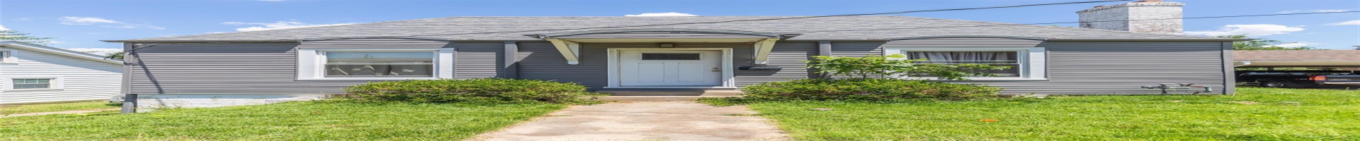 Residential For Sale Bungalow-style house with a chimney, a front lawn, and roof with shingles