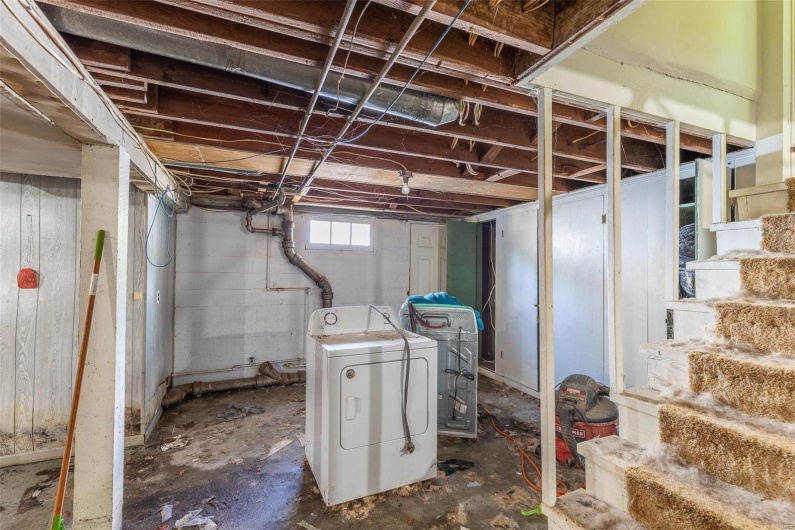 Below grade area with separate washer and dryer