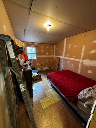 Bedroom with baseboard heating