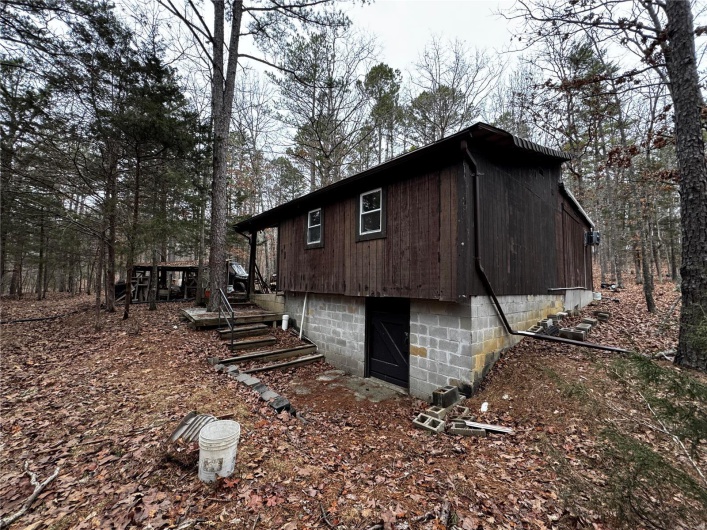 View of side of property featuring a garage