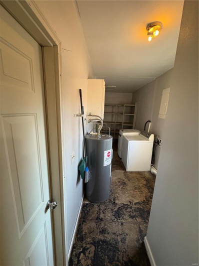 Clothes washing area with hookup for a washing machine and water heater