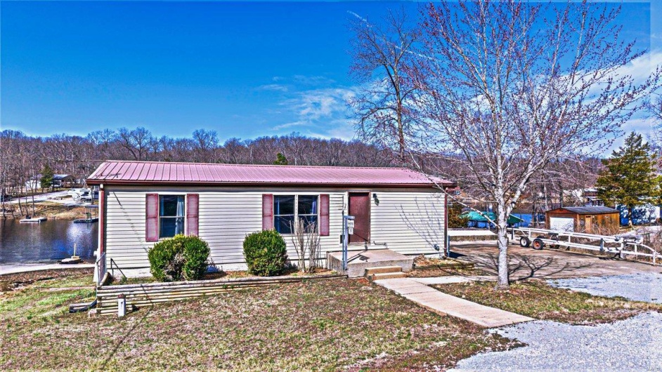 View of front of property with metal roof