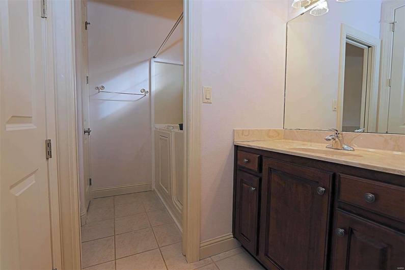 Bathroom with vanity and tile patterned floors
