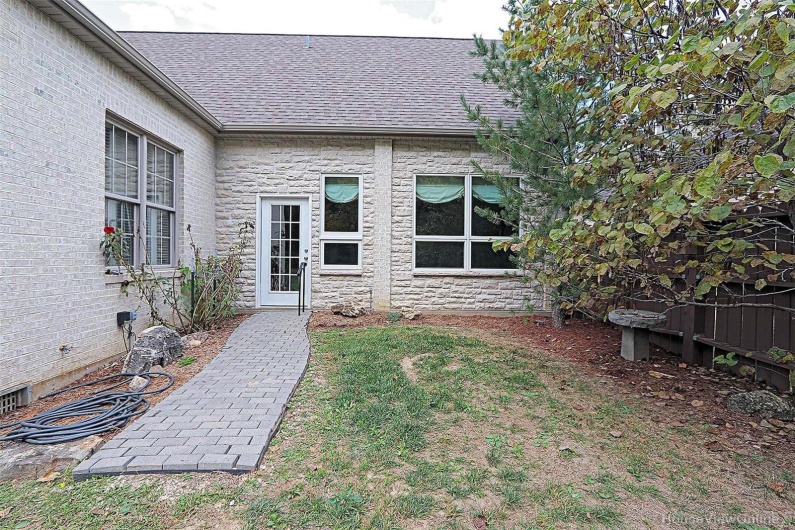 Property entrance with a yard