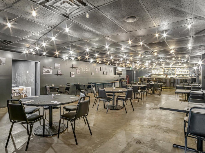 Dining room with concrete flooring