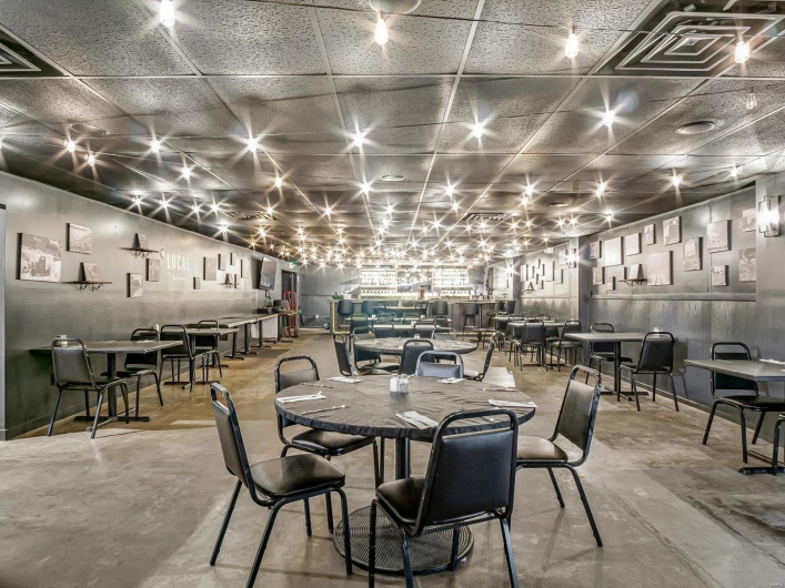 Dining space featuring concrete floors