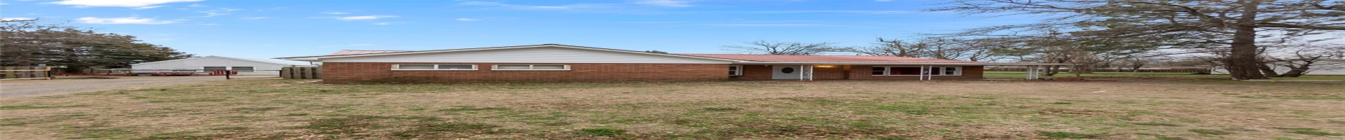 Residential For Sale Ranch-style house with brick siding, metal roof, a front yard, and fence