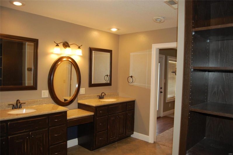 Full bath featuring visible vents, recessed lighting, tile patterned flooring, baseboards, and vanity