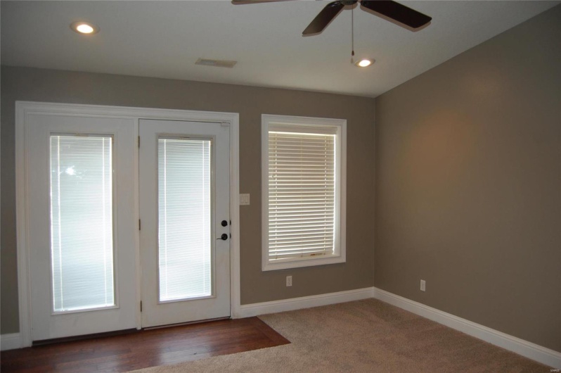 Entryway featuring baseboards, visible vents, recessed lighting, ceiling fan, and carpet flooring