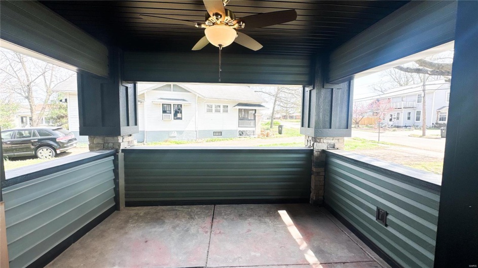 View of patio with a porch and a ceiling fan