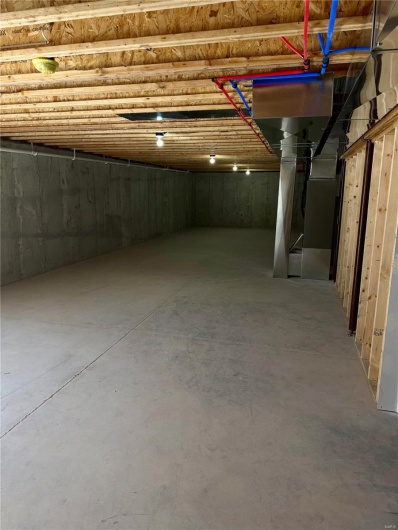 Below grade area featuring heating unit
