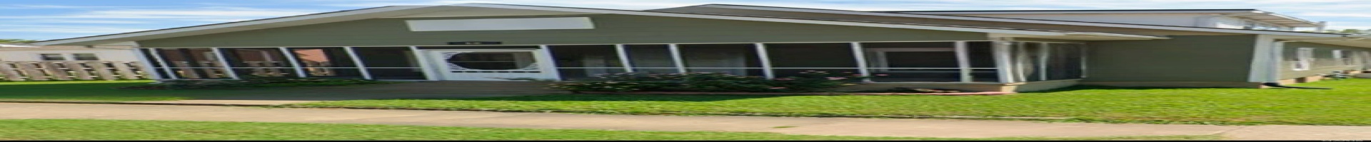 Residential For Sale View of front of house featuring a sunroom, a front lawn, and fence