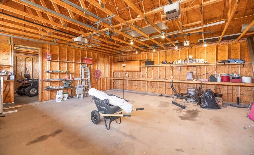 Garage featuring a garage door opener