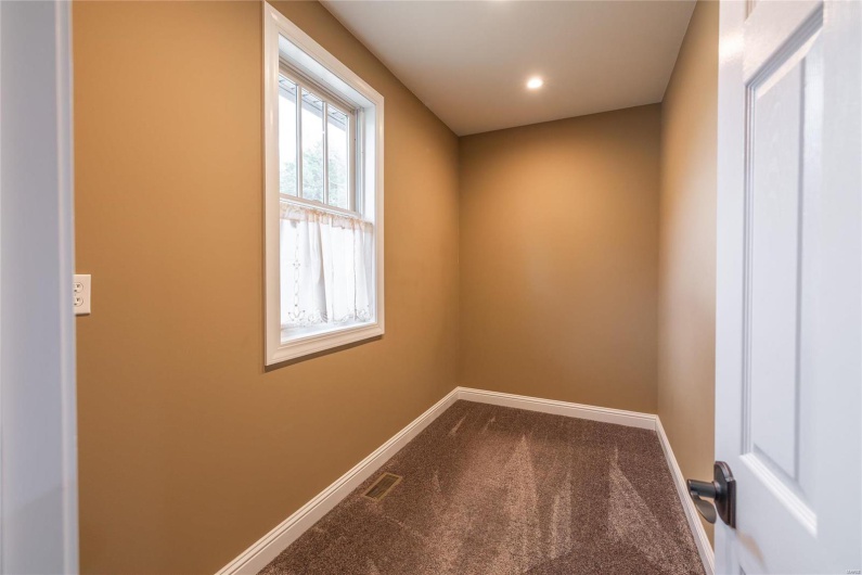 Spare room with recessed lighting, visible vents, baseboards, and carpet flooring