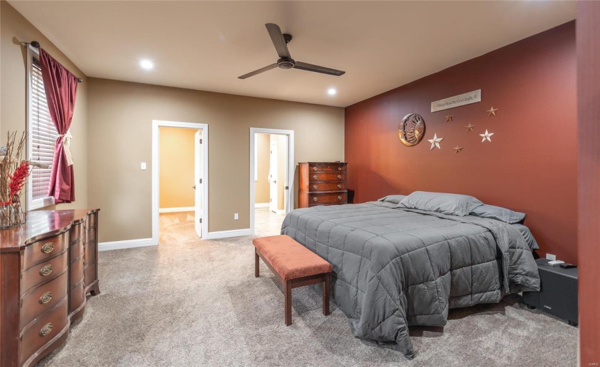Bedroom featuring recessed lighting, baseboards, carpet, and a ceiling fan