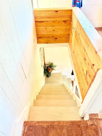 Stairs with wood walls