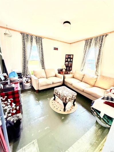 Living room with concrete flooring