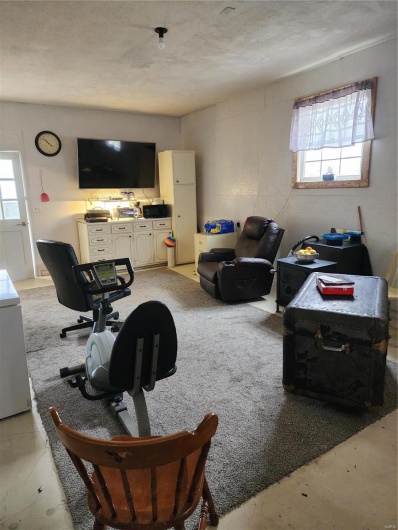 Living room with a textured ceiling
