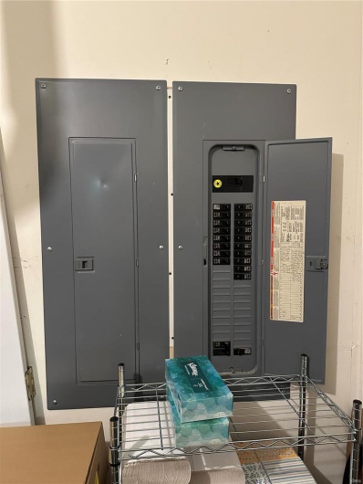 Utility room featuring electric panel