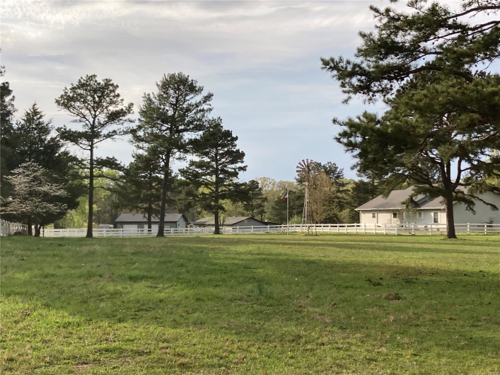 View of yard featuring fence