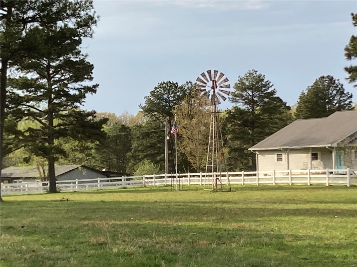 View of yard featuring fence
