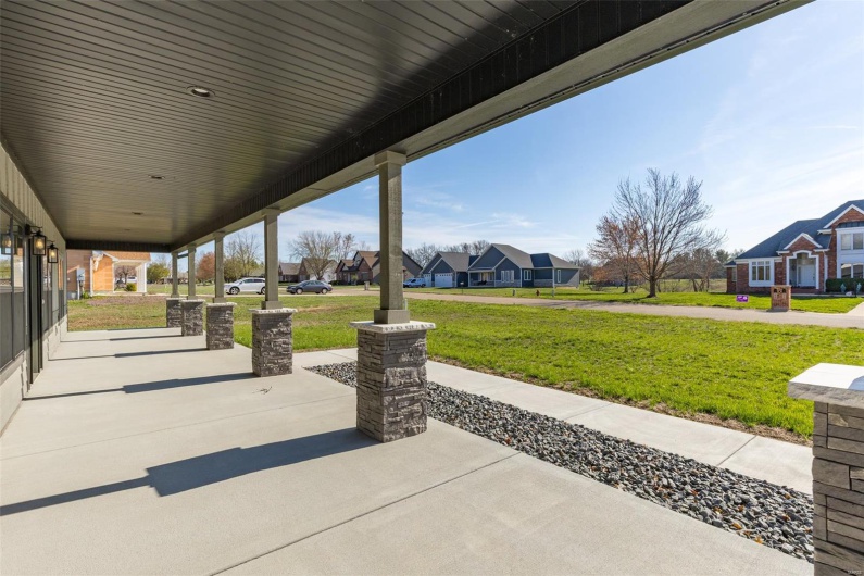 View of patio featuring covered porch and a residential view