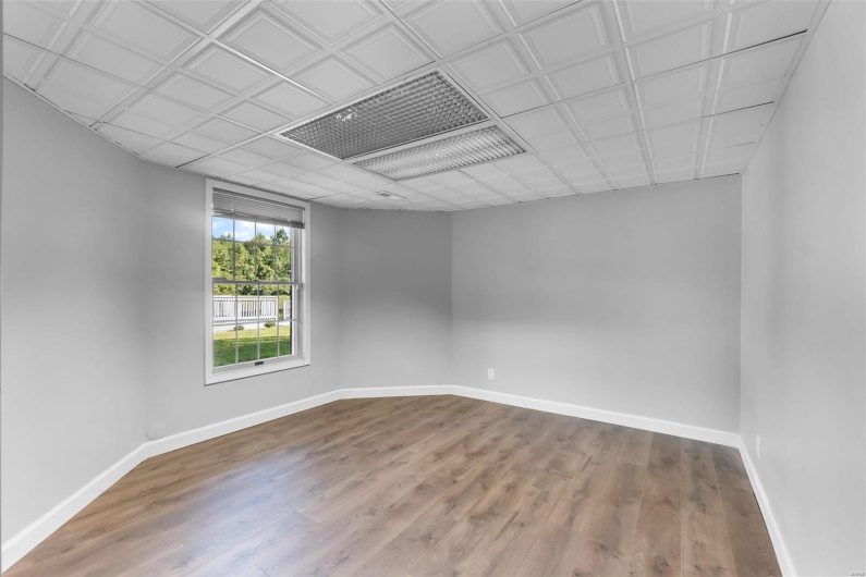 Unfurnished room featuring wood-type flooring