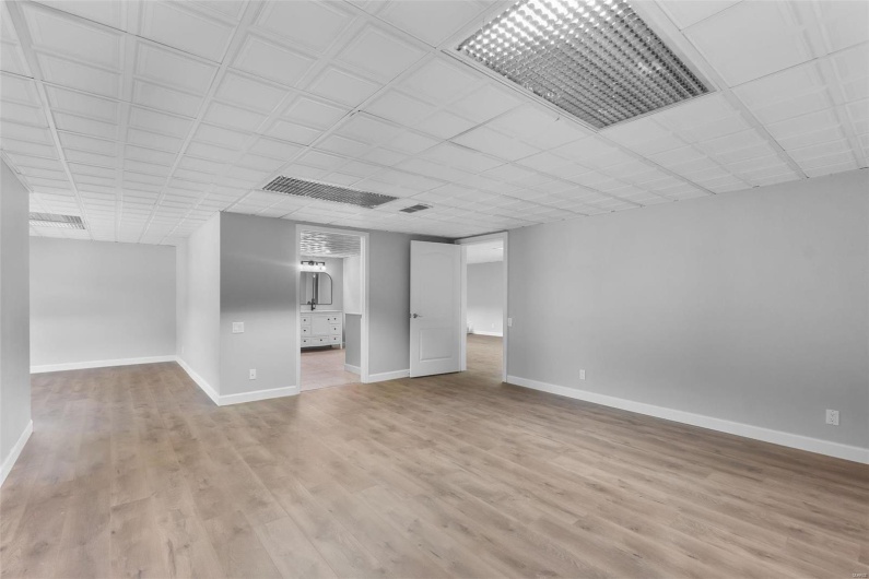 Unfurnished living room with light hardwood / wood-style flooring