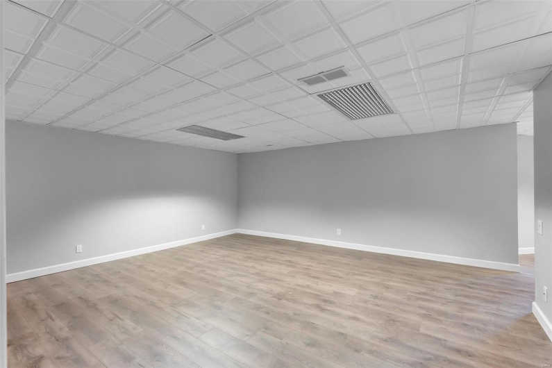 Empty room featuring light wood-type flooring