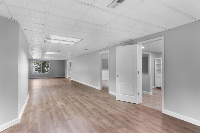 Spare room featuring light wood-type flooring