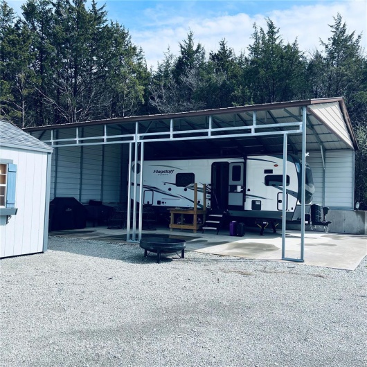 View of vehicle parking with driveway