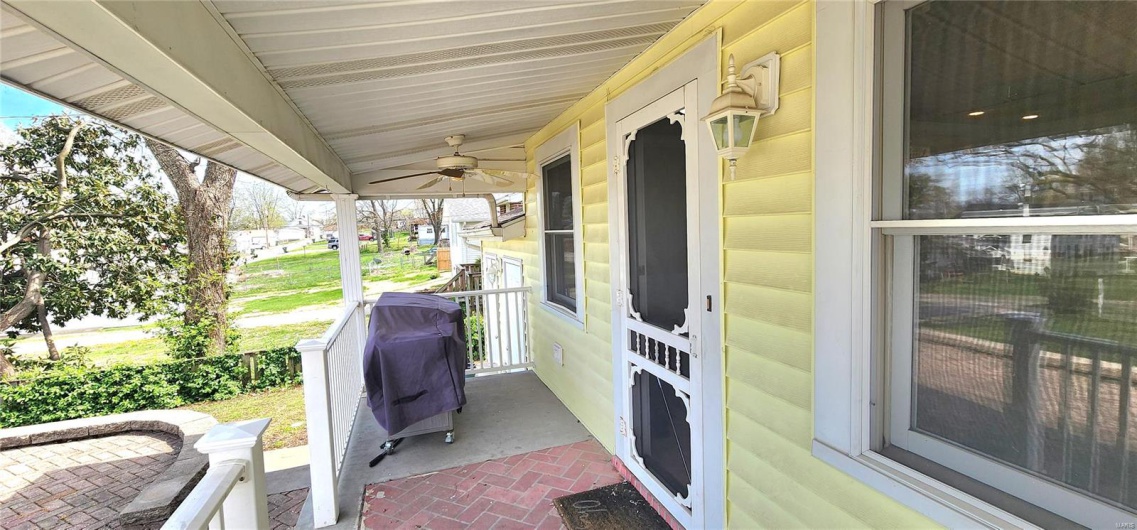 View of patio with a porch, a grill, and ceiling fan