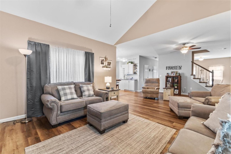 Living area with high vaulted ceilin