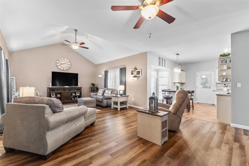 Living room with lofted ceiling