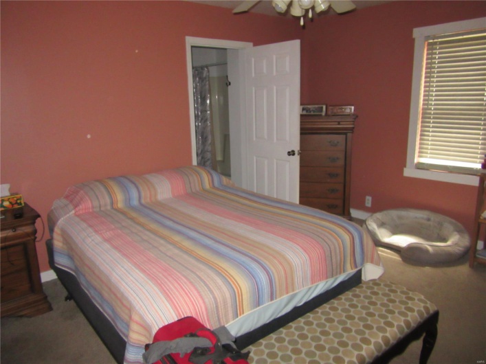 Bedroom featuring carpet floors and a ceiling fan