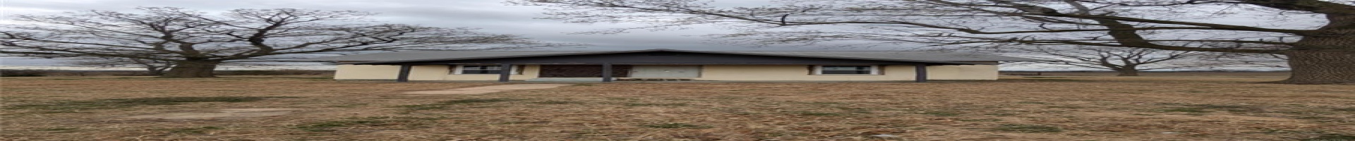 Residential For Sale View of front of property with metal roof and a front yard