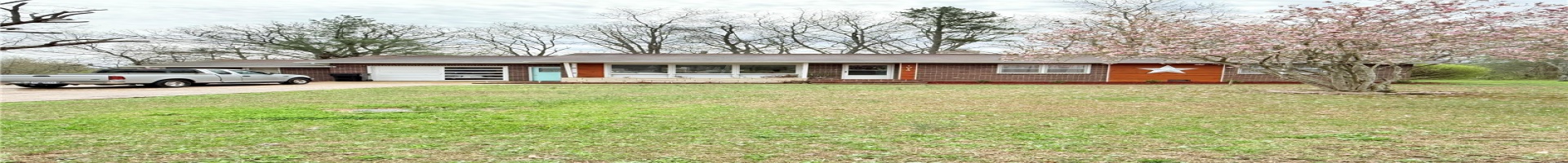 Residential For Sale Ranch-style home with a chimney, a garage, concrete driveway, brick siding, and a front lawn