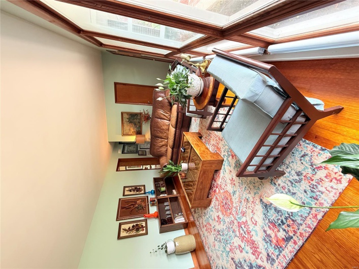 Living area with wood finished floors
