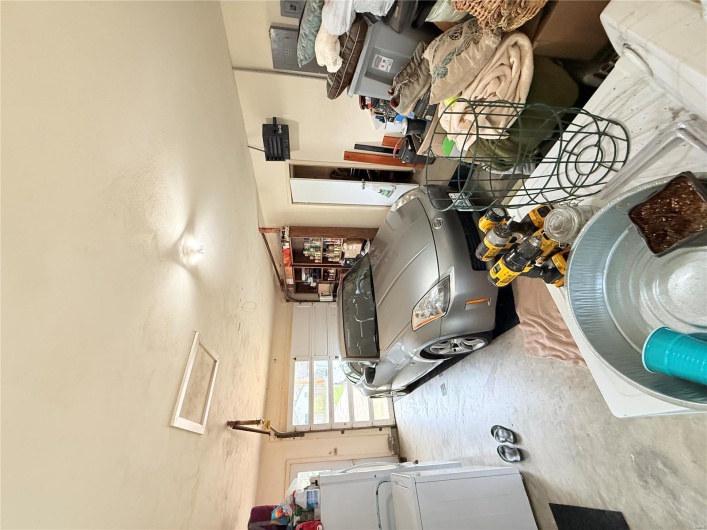 Garage featuring washer / dryer