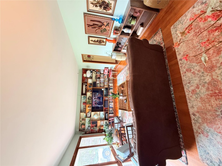 Living area with wood finished floors