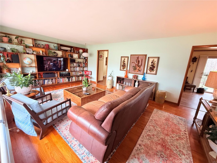 Living room featuring wood finished floors