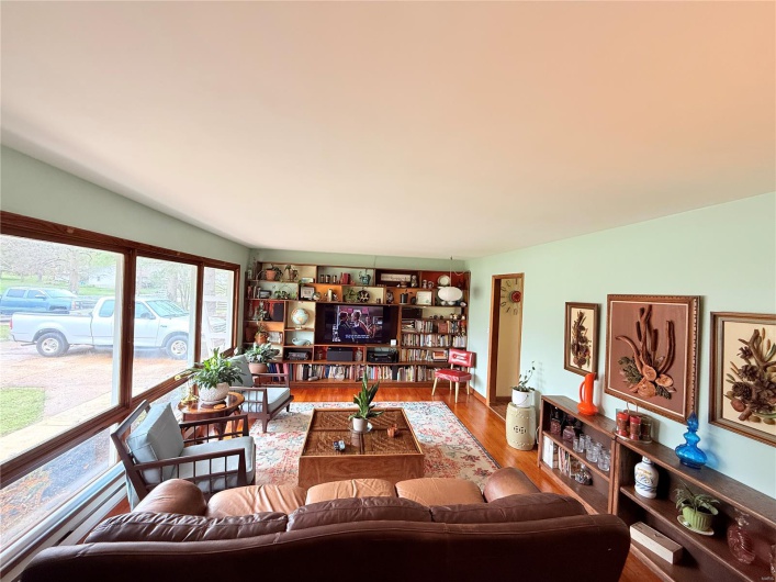 Living area featuring wood finished floors